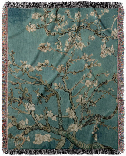 Spring woven throw blanket, made of 100% cotton, providing a soft and cozy texture with an almond blossom by Vincent Van Gogh design for home decor.