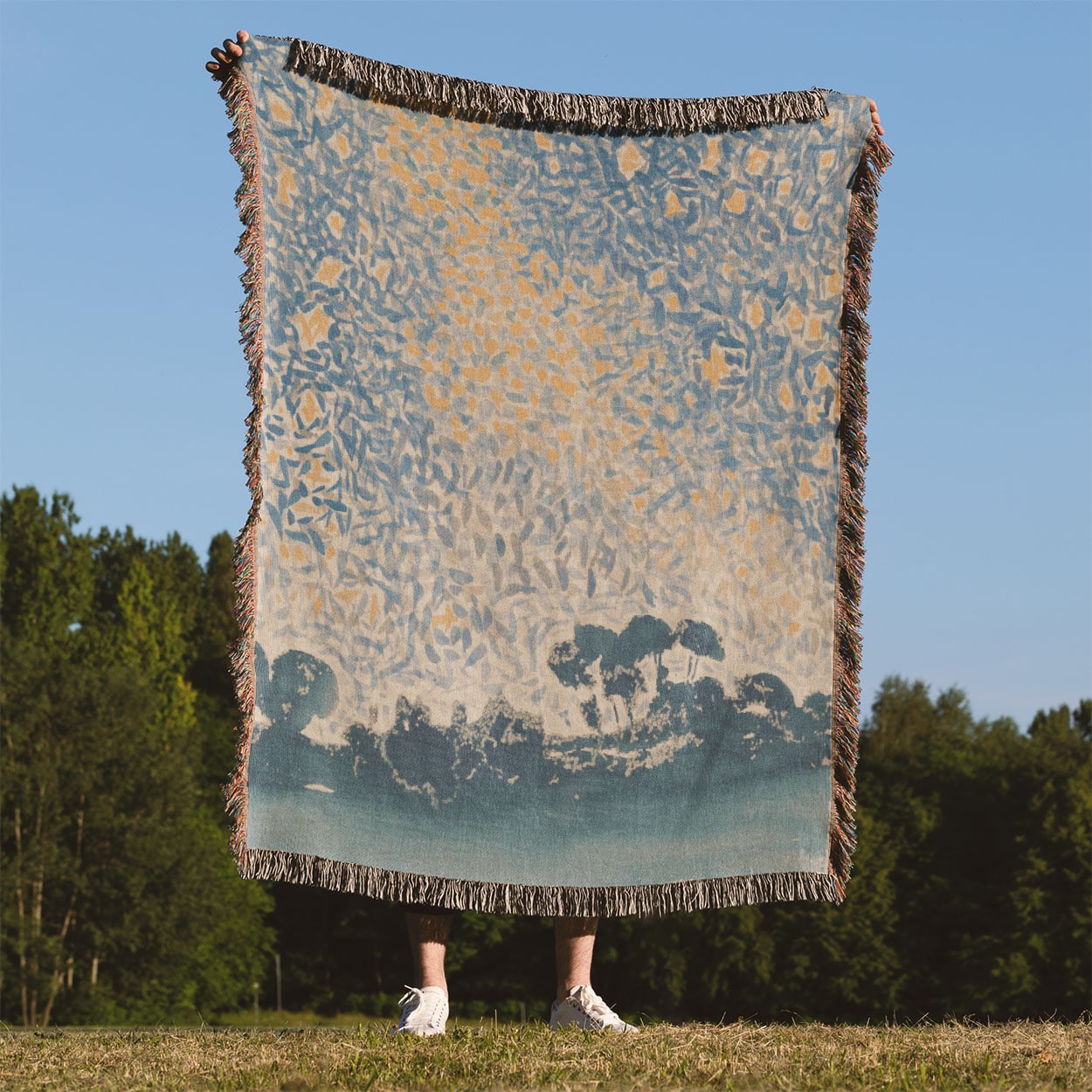 Starry Sky Woven Blanket Held Up Outside