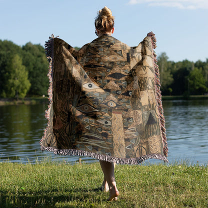The Lady in Gold Woven Blanket Held on a Woman's Back Outside
