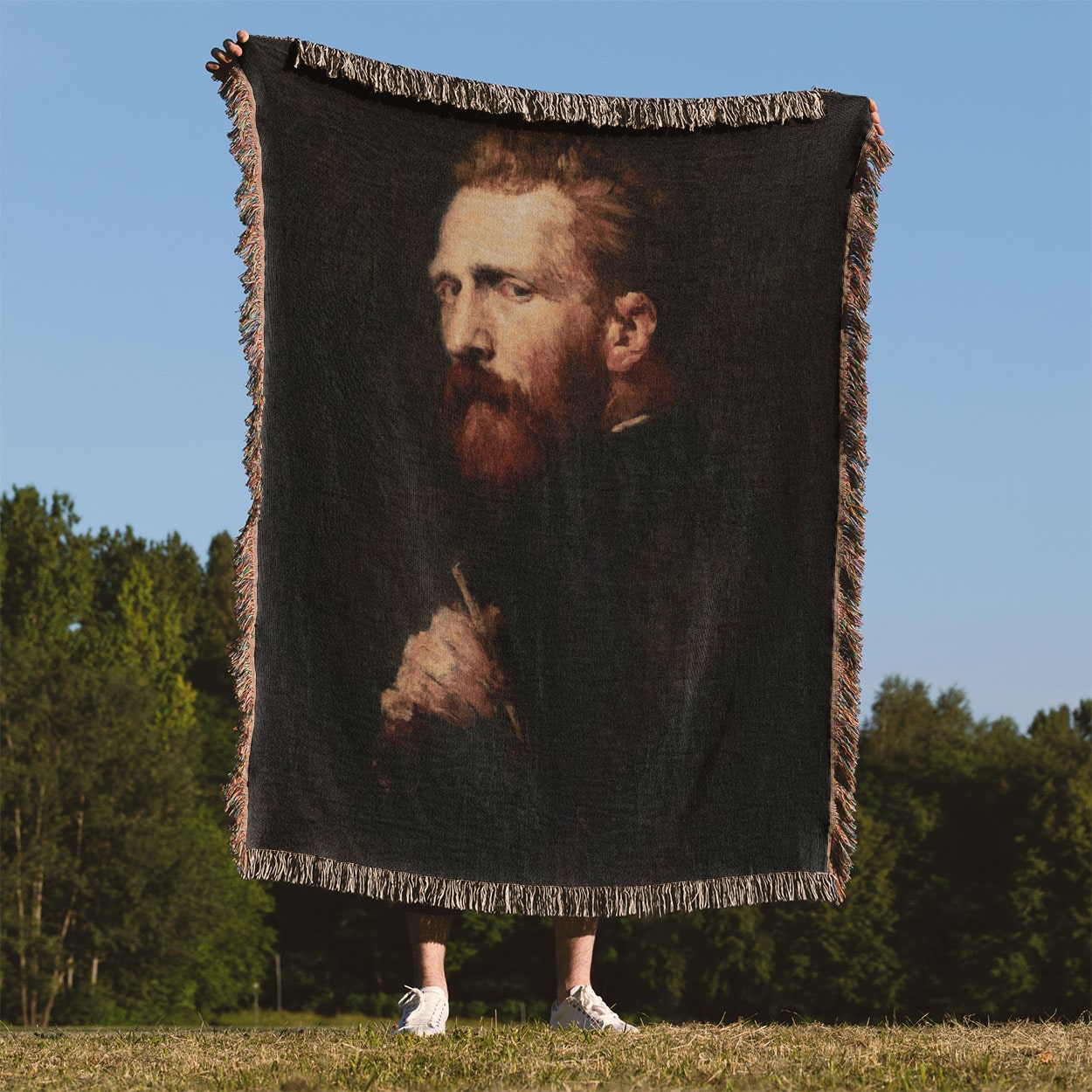 The Painter Woven Blanket Held Up Outside