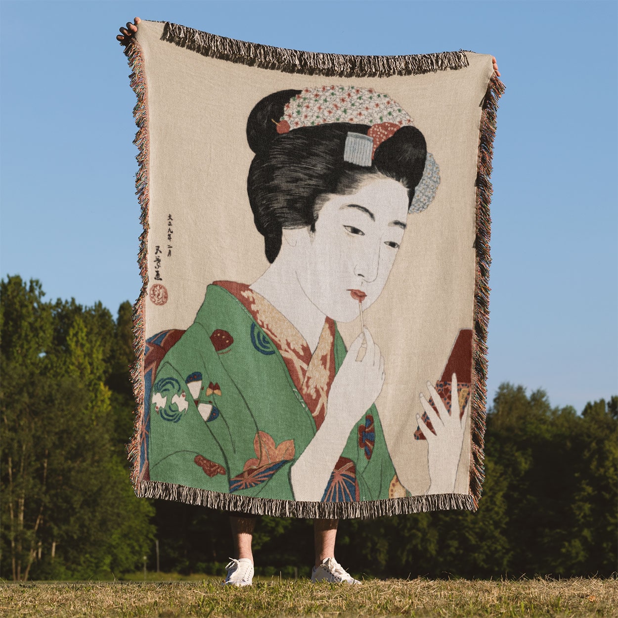 Traditional Japanese Woven Blanket Held Up Outside