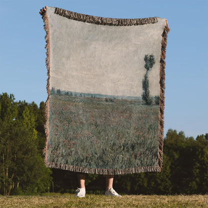 Tranquil Landscape Woven Throw Blanket Held Up Outside