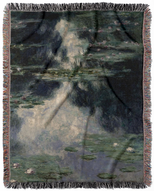 Tranquility woven throw blanket, crafted from 100% cotton, delivering a soft and cozy texture with a Monet lilies painting for home decor.