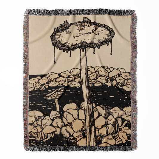 Trippy Mushroom woven throw blanket, crafted from 100% cotton, featuring a soft and cozy texture with a cool dripping mushroom design for home decor.