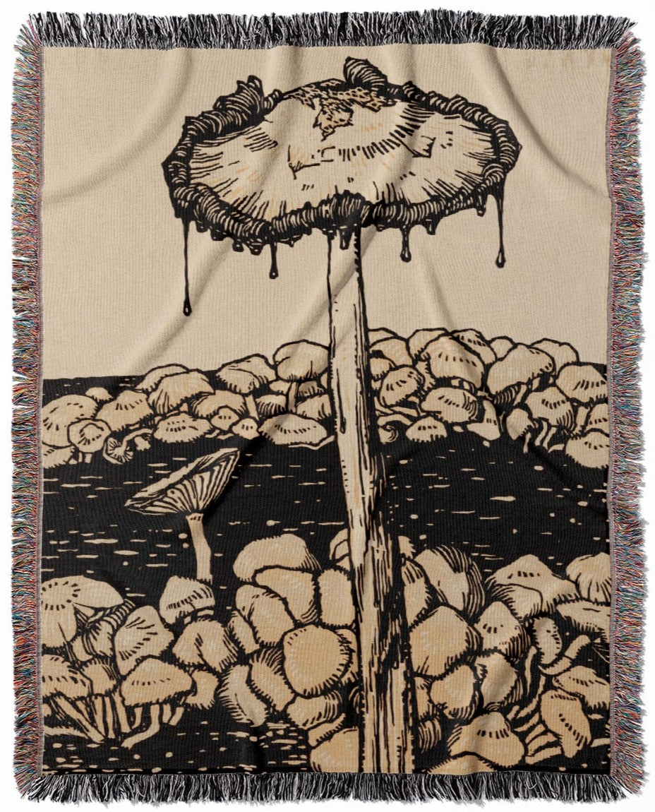 Trippy Mushroom woven throw blanket, crafted from 100% cotton, featuring a soft and cozy texture with a cool dripping mushroom design for home decor.