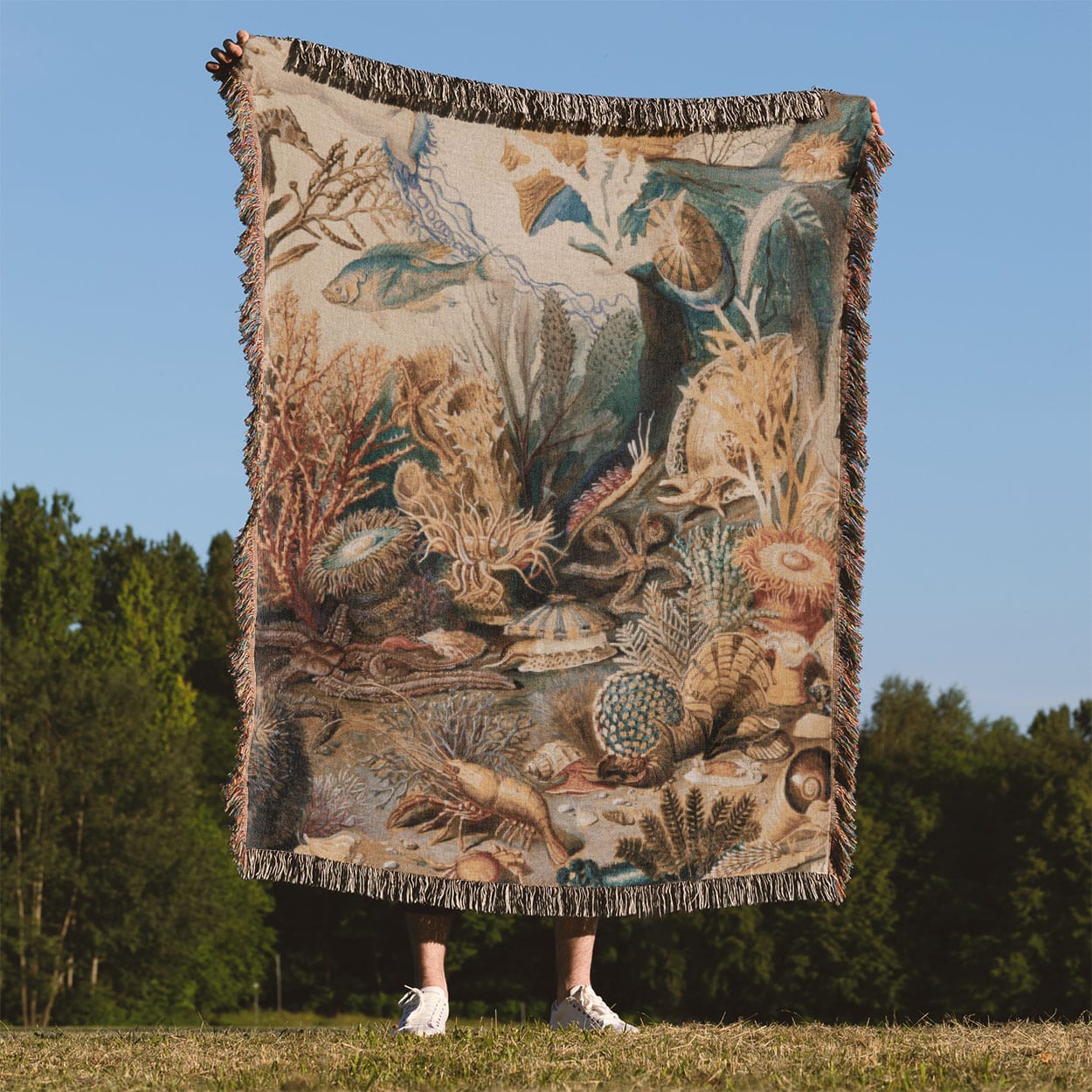 Under the Sea Woven Blanket Held Up Outside
