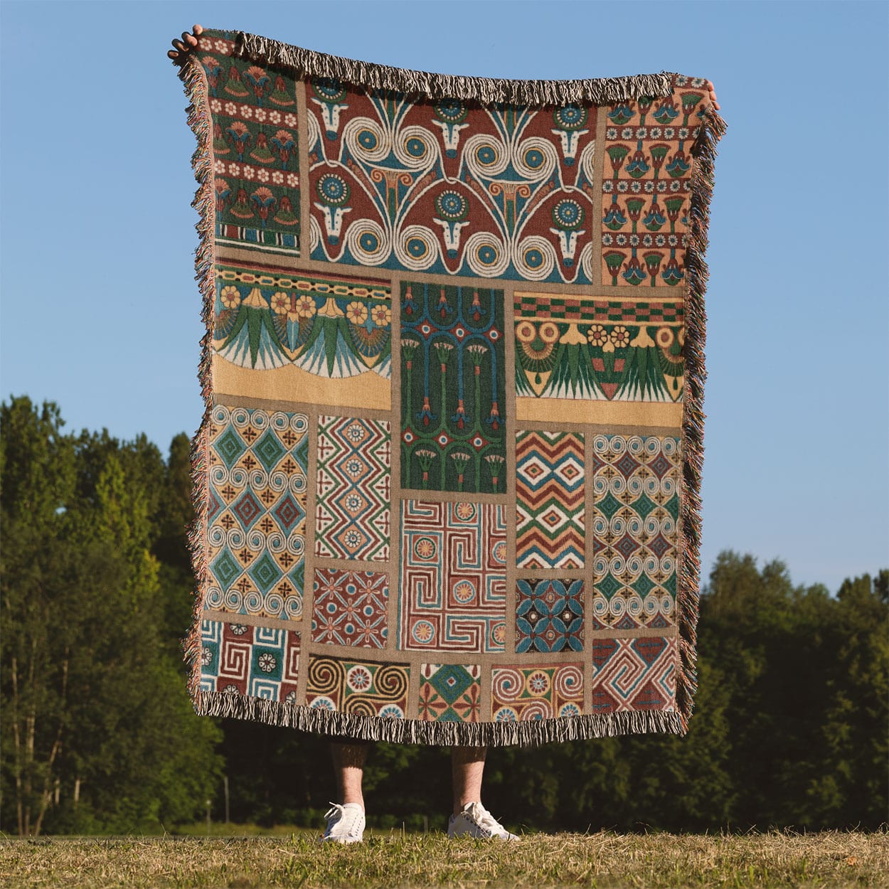 Unique Designs Woven Blanket Held Up Outside