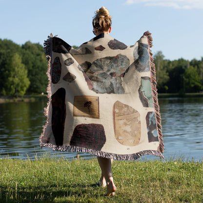 Unique Gemstone Woven Throw Blanket Held on a Woman's Back Outside