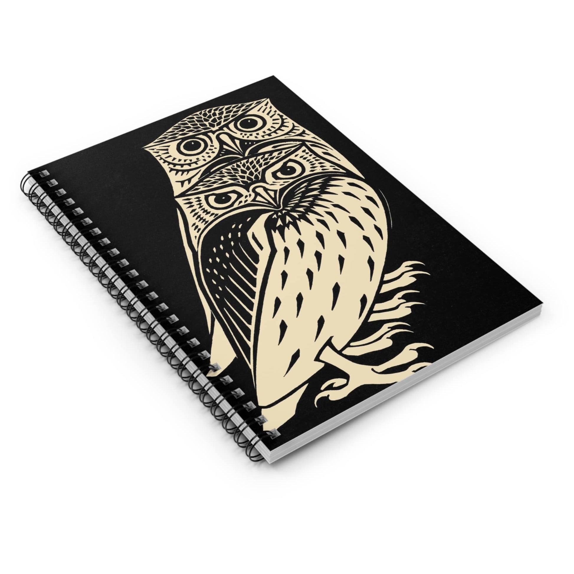 Unique Owl Spiral Notebook Laying Flat on White Surface