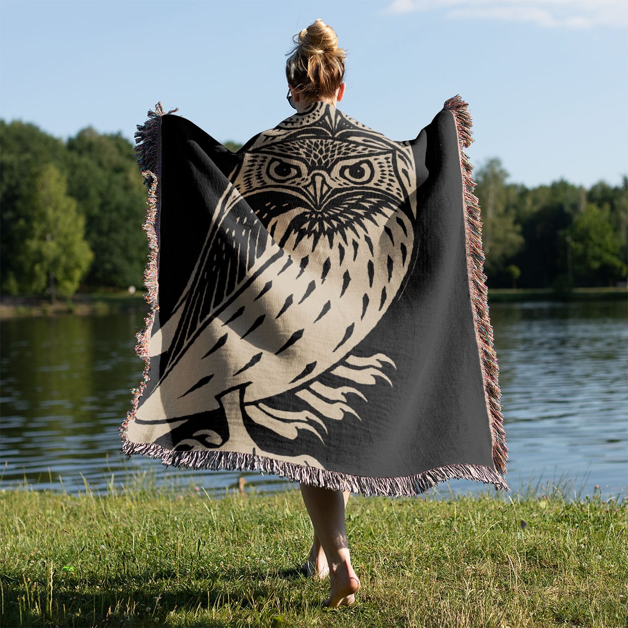 Unique Owl Held on a Woman's Back Outside