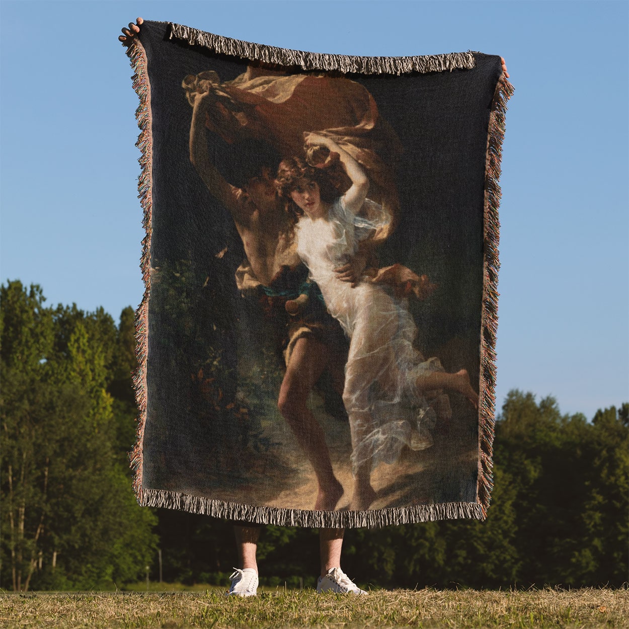 Victorian Lovers Woven Blanket Held Up Outside