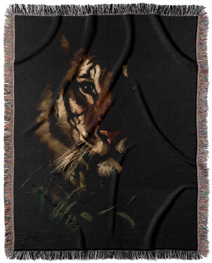 Dark Tiger woven throw blanket, made with 100% cotton, providing a soft and cozy texture with an animal portrait design for home decor.