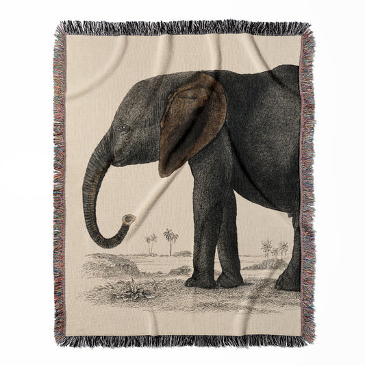 Vintage Animals woven throw blanket, made with 100% cotton, featuring a soft and cozy texture with a cute elephant design for home decor.