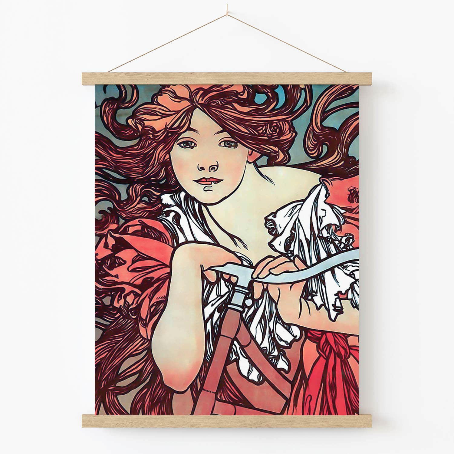 Woman with Flowing Red Hair on a Bicycle Art Print in Wood Hanger Frame on Wall