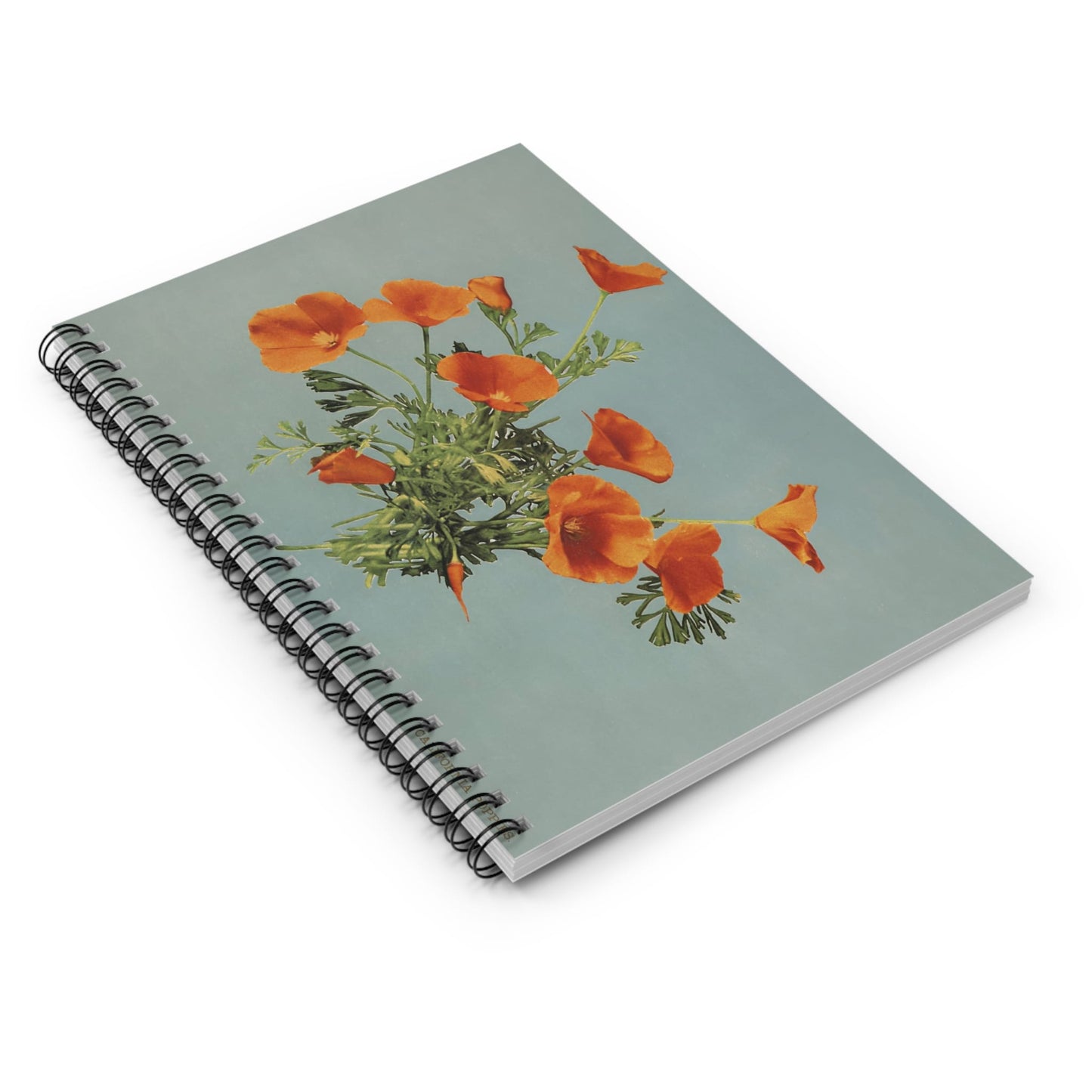 Vintage Floral Spiral Notebook Laying Flat on White Surface