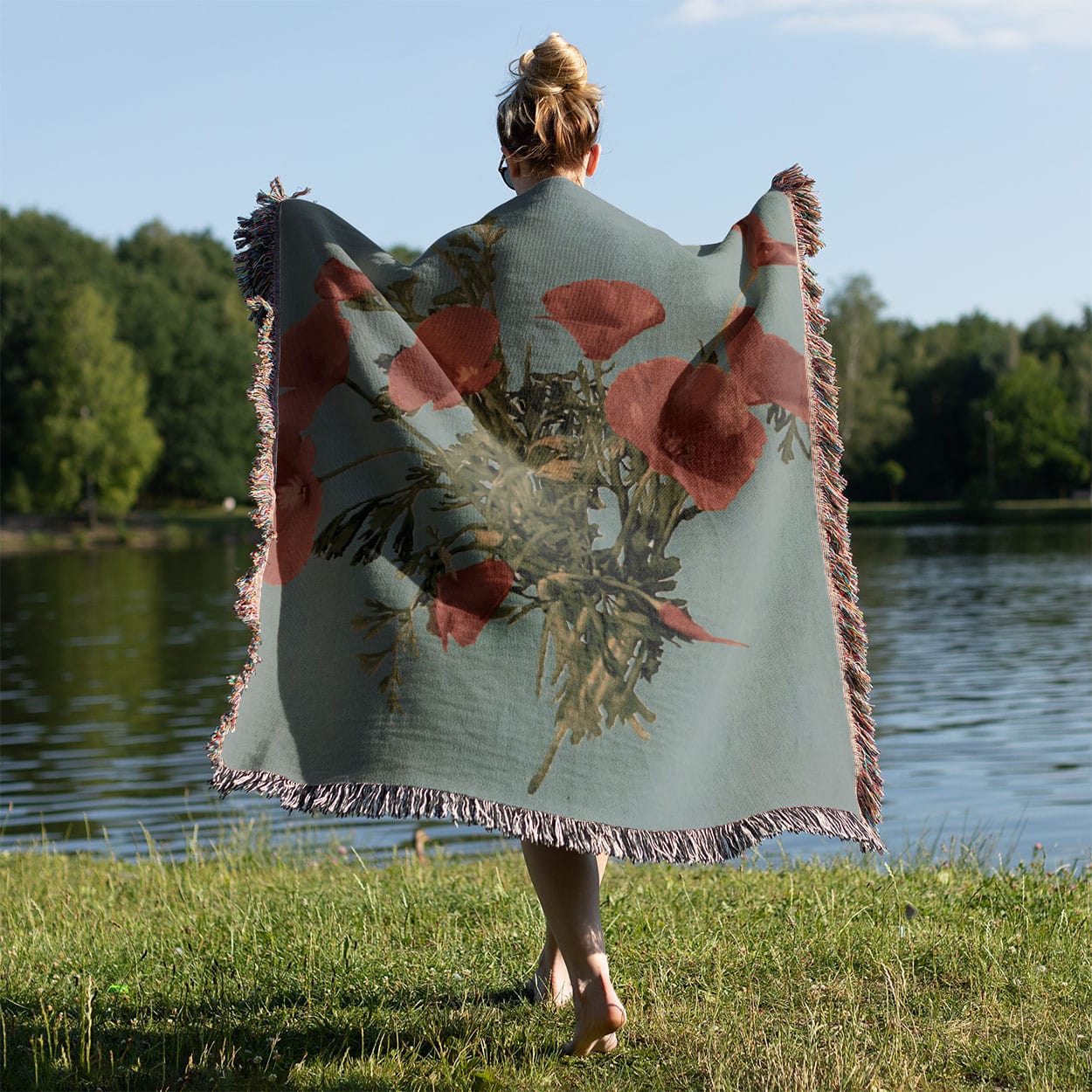 Vintage Floral Woven Blanket Held on a Woman's Back Outside