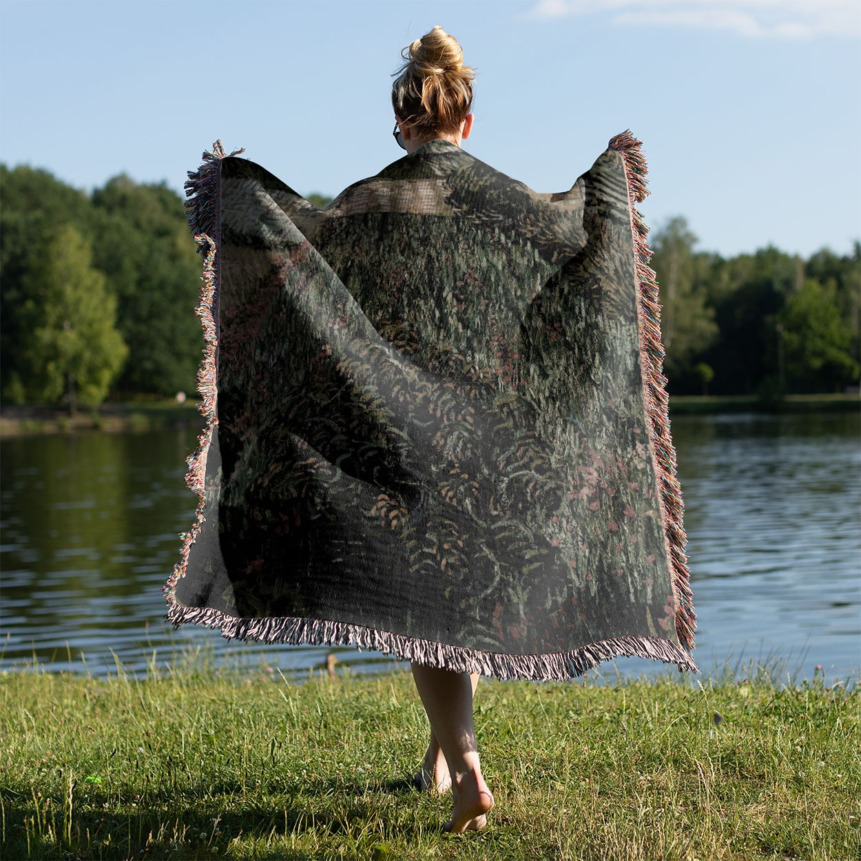 Vintage Landscape Woven Blanket Held on a Woman's Back Outside