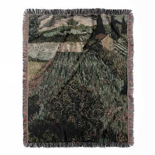 Vintage Landscape woven throw blanket, made with 100% cotton, providing a soft and cozy texture with a field of poppies design for home decor.
