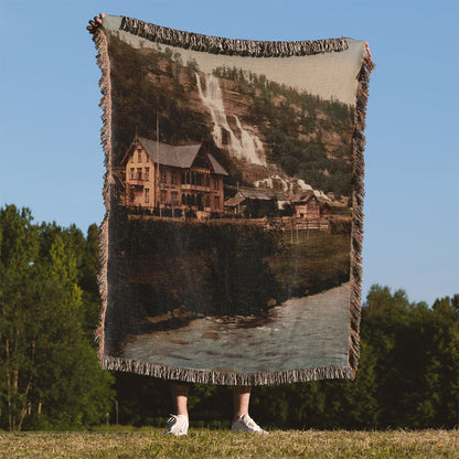 Vintage Mountain River Woven Blanket Held Up Outside