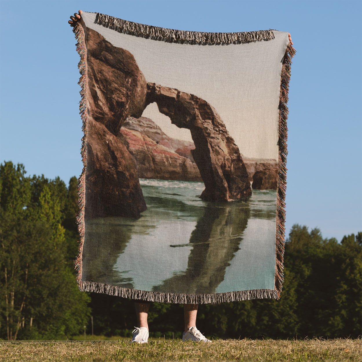 Vintage Ocean Woven Blanket Held Up Outside