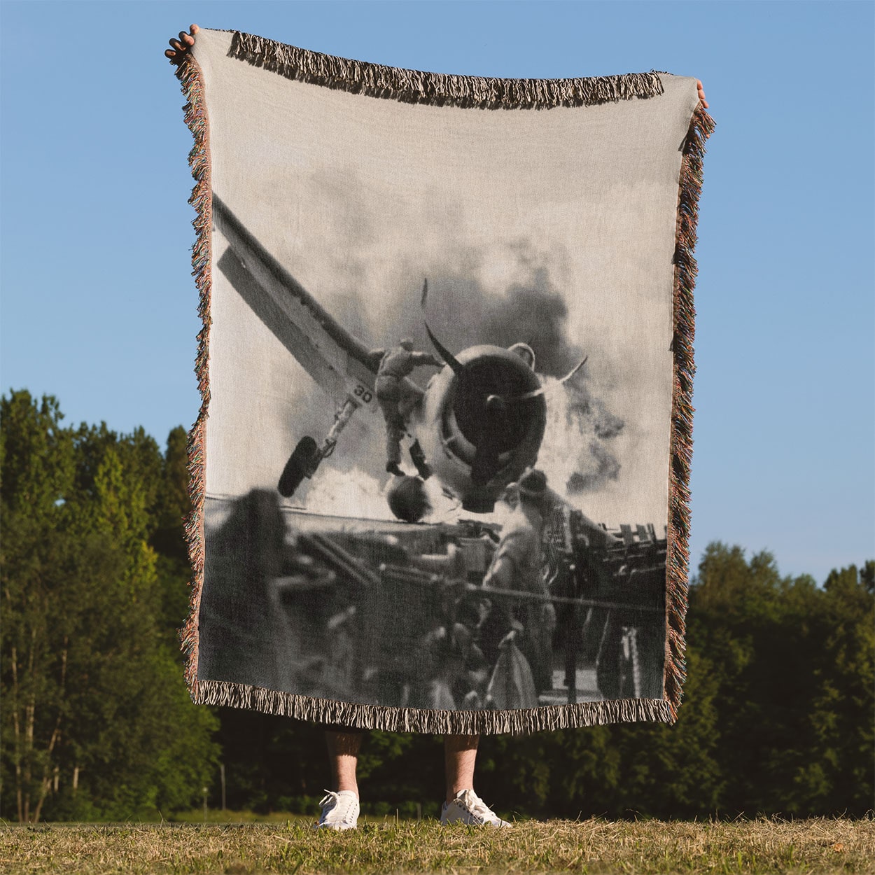 Vintage Plane Crash Photo Woven Blanket Held Up Outside
