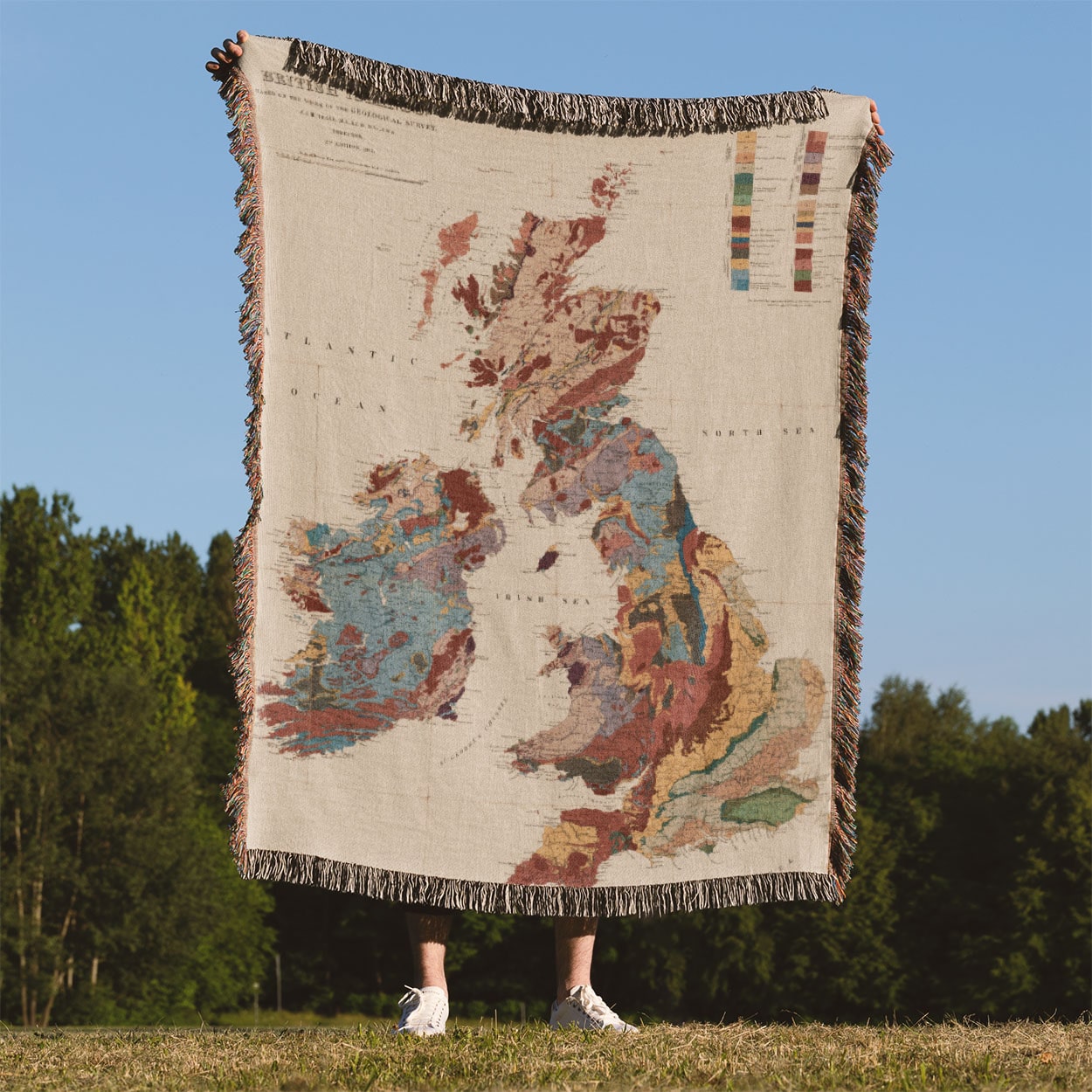 Vintage United Kingdom Map Woven Blanket Held Up Outside