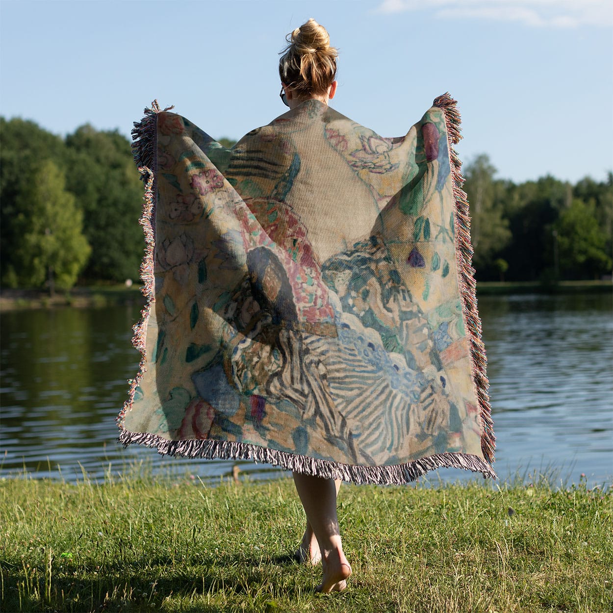 Whimsical Woven Blanket Held on a Woman's Back Outside