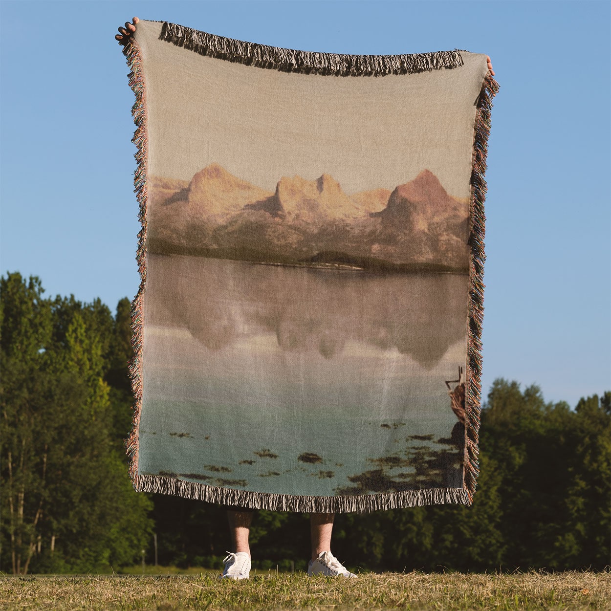 Winter Landscape Woven Throw Blanket Held Up Outside