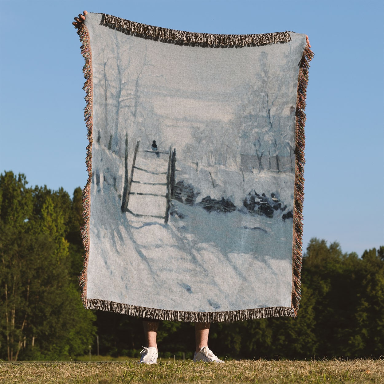 Winter Woven Blanket Held Up Outside