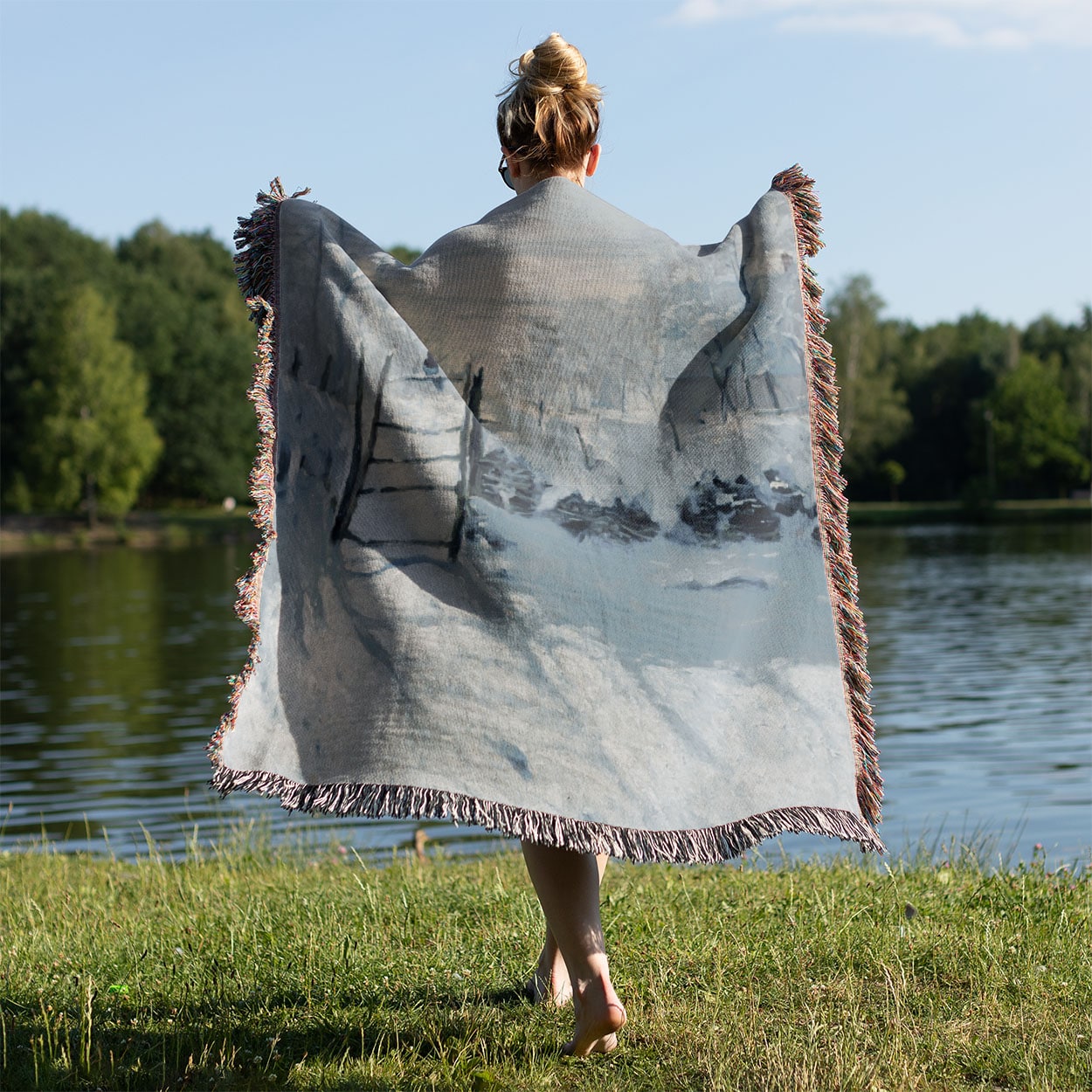 Winter Woven Blanket Held on a Woman's Back Outside