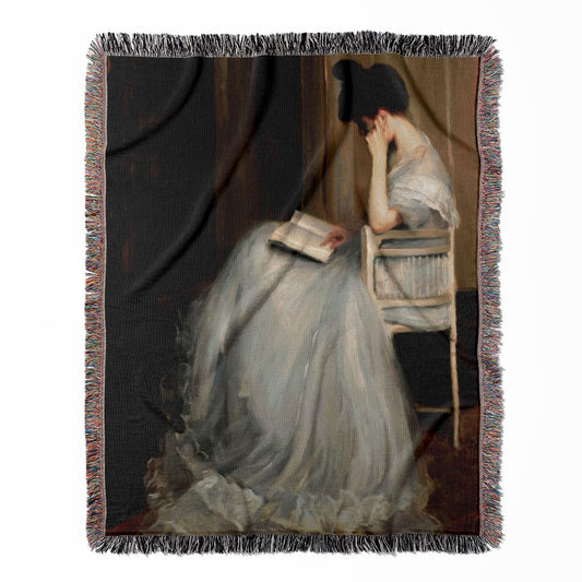 Woman Reading woven throw blanket, made of 100% cotton, delivering a soft and cozy texture with a vintage oil painting theme for home decor.