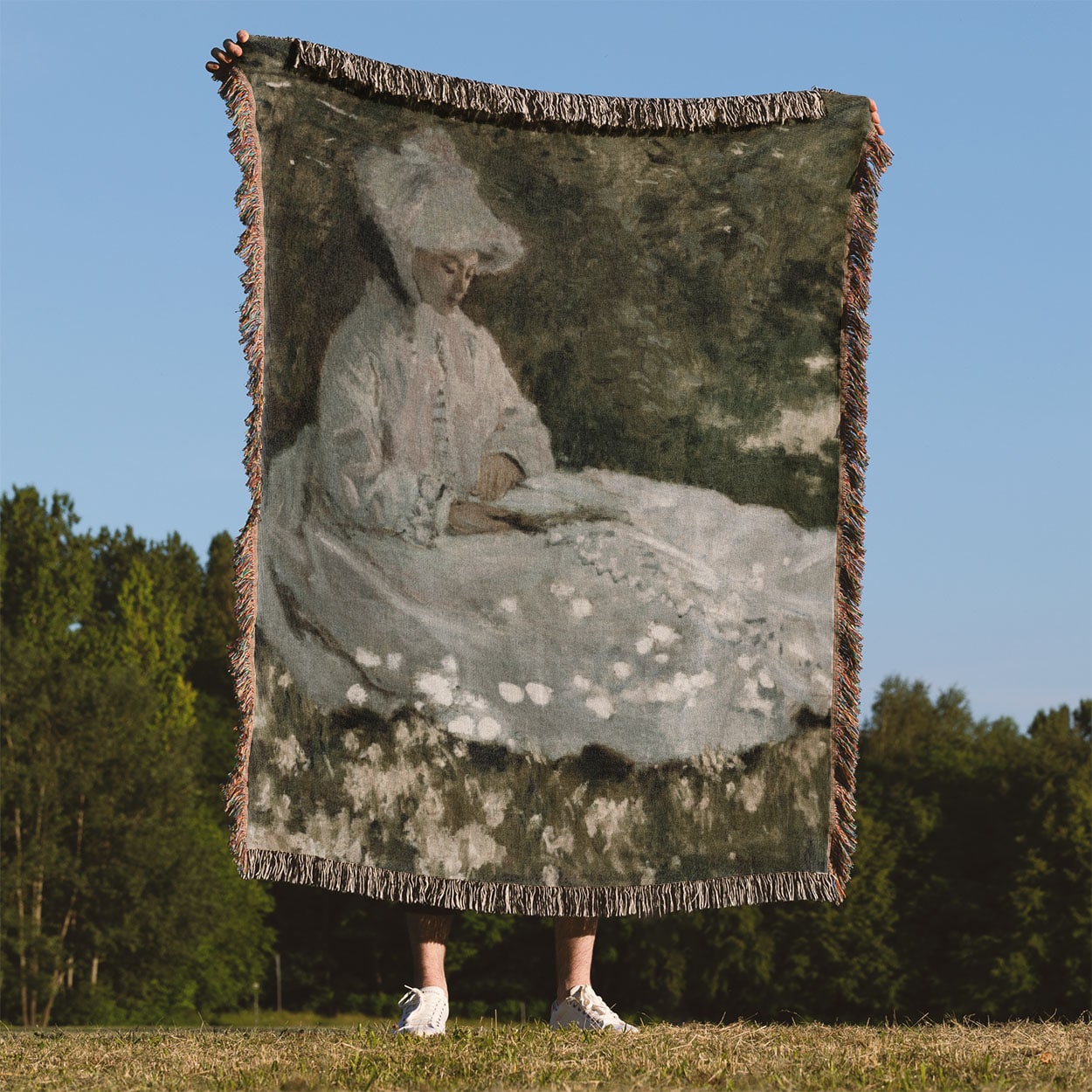 Woman in a White Dress Woven Throw Blanket Held Up Outside