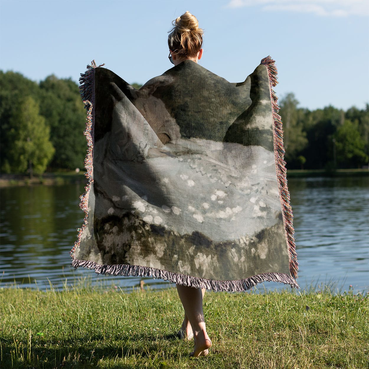 Woman in a White Dress Woven Throw Blanket Held on a Woman's Back Outside